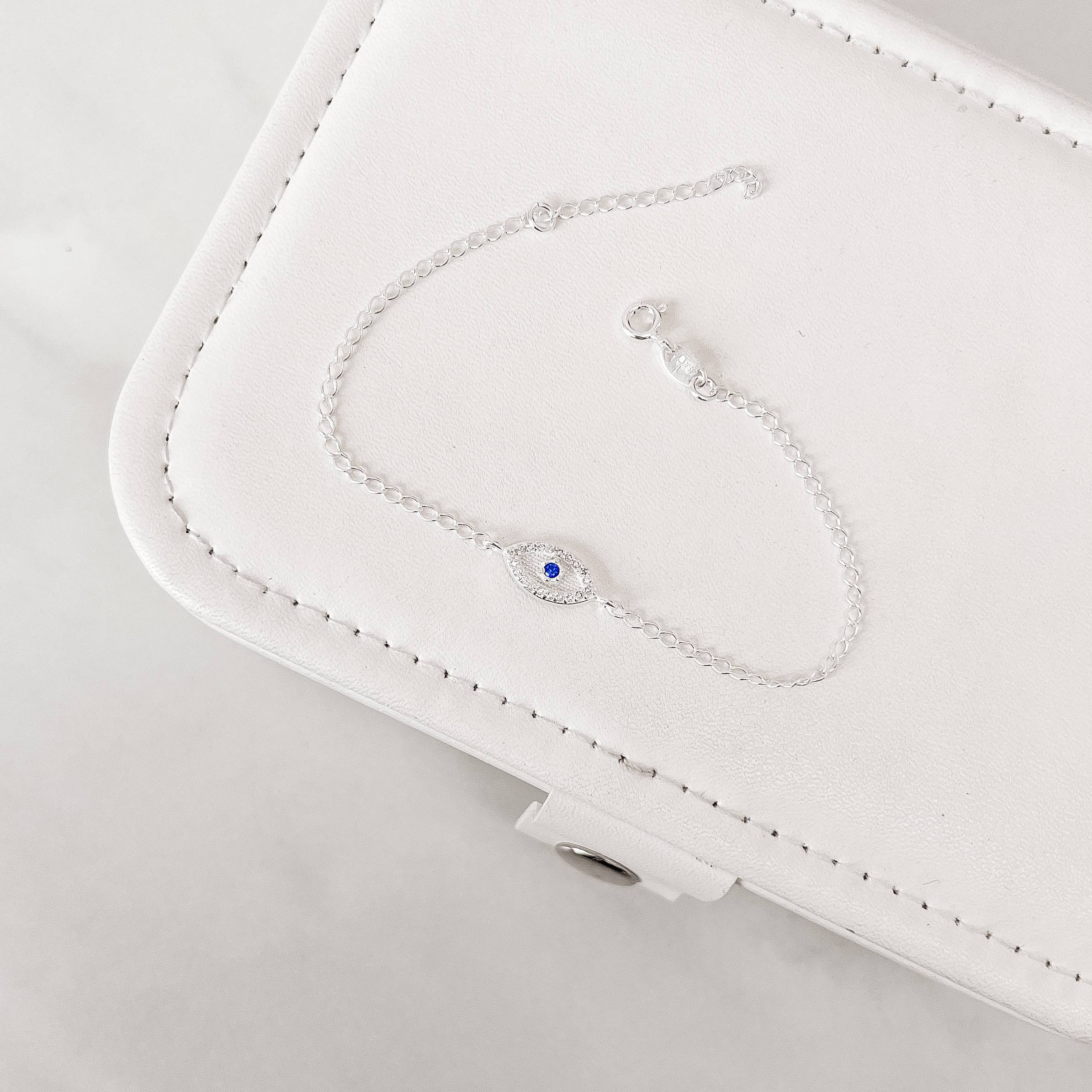 Pulseira entremeio olho cravejado detalhe zircônia azul 12mm