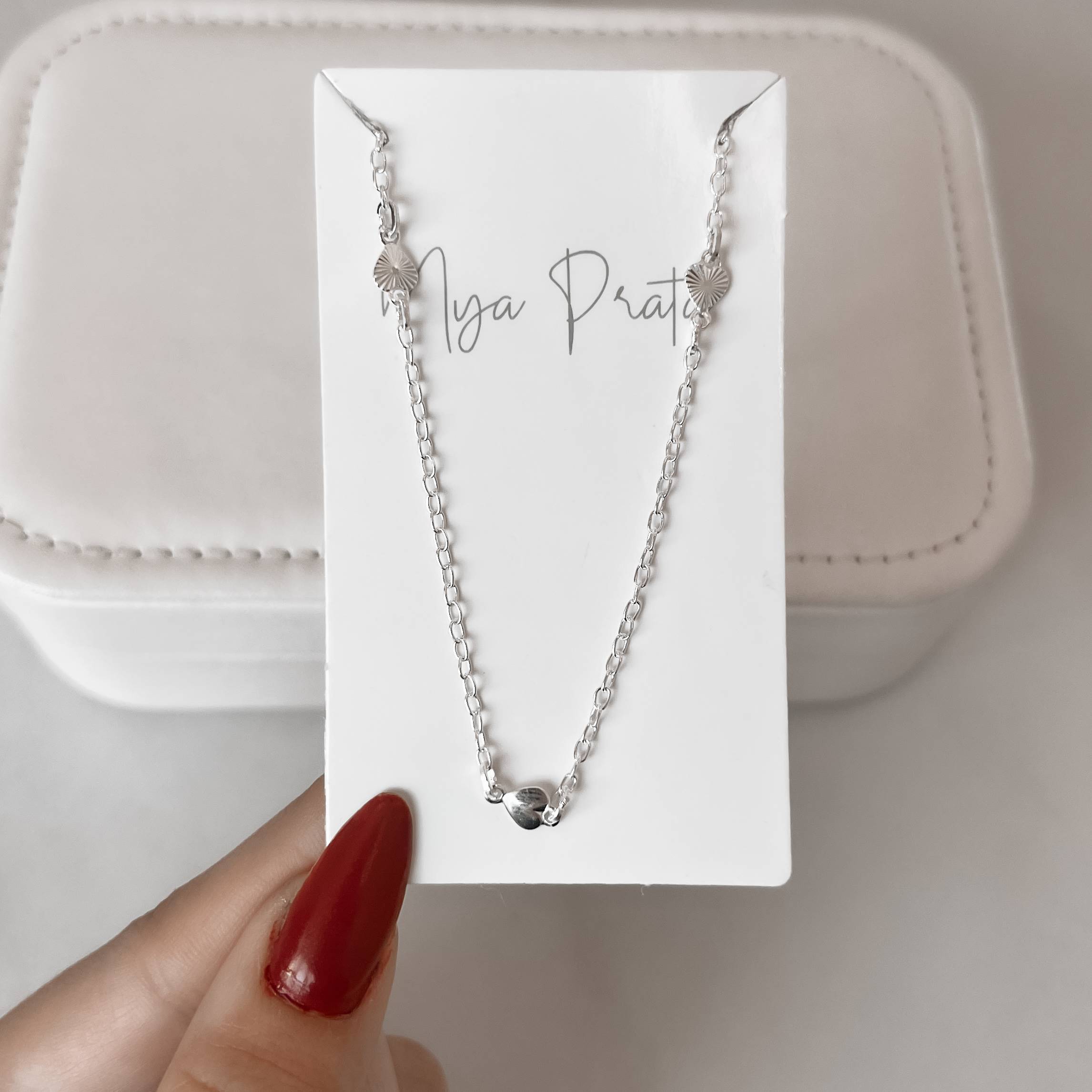 Imagem Secundária Colar entremeios corações liso e com vinco 5mm 60cm