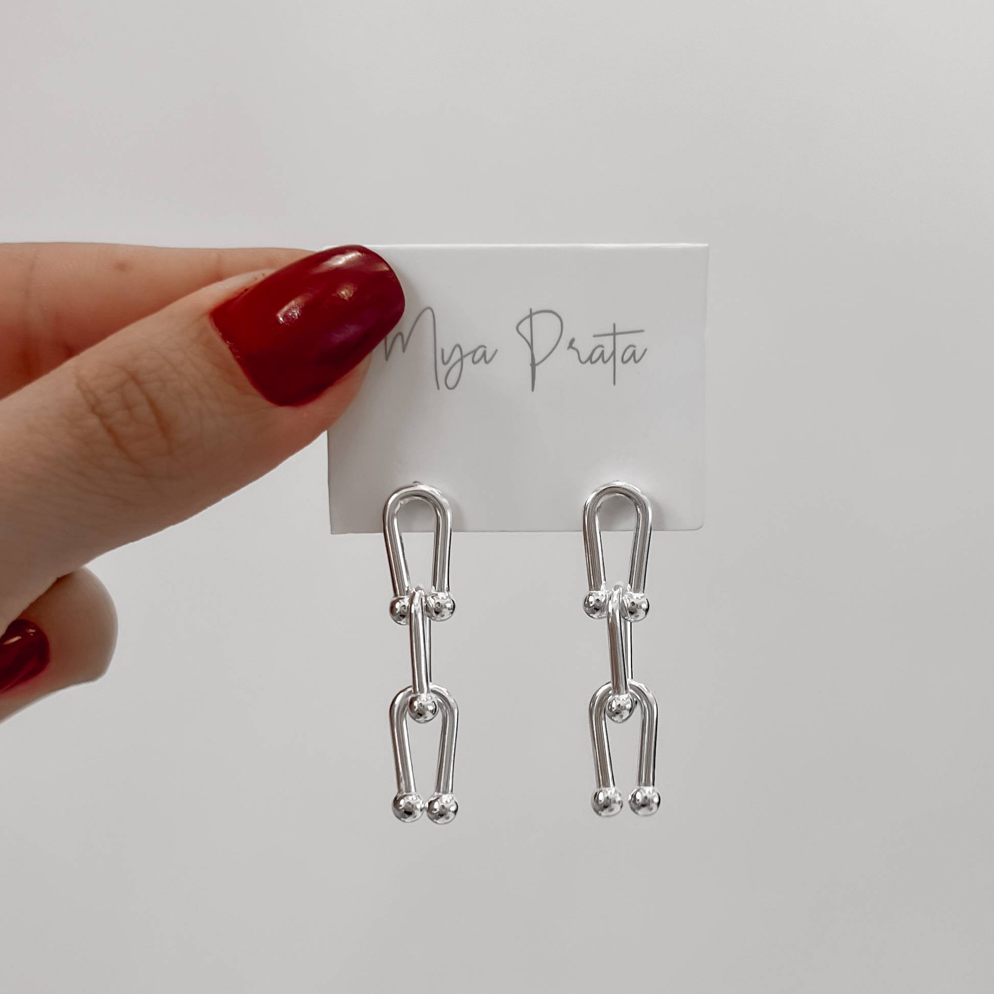 Imagem Secundária Brinco elos com bolinhas 36mm