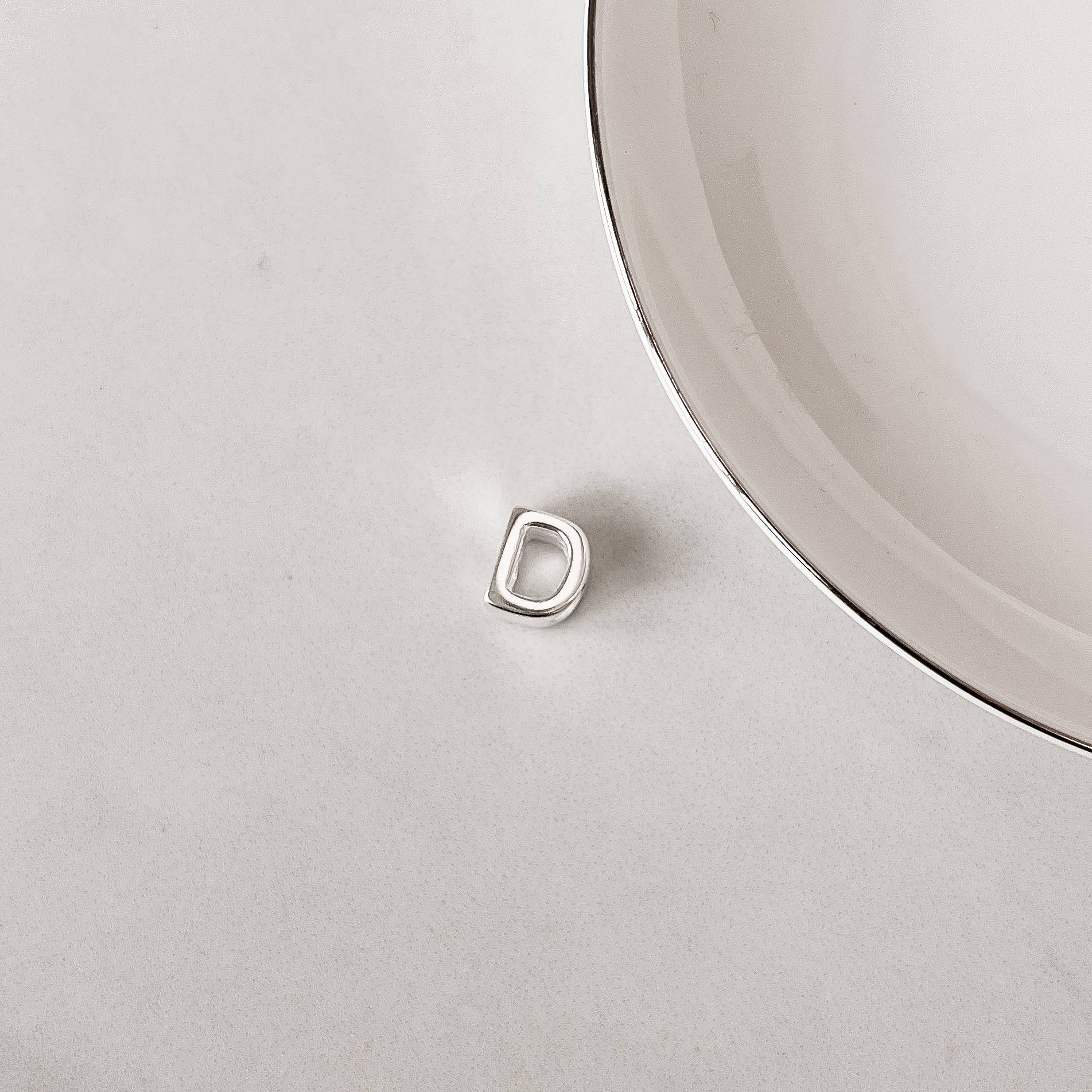 Berloque separador letra D 10mm