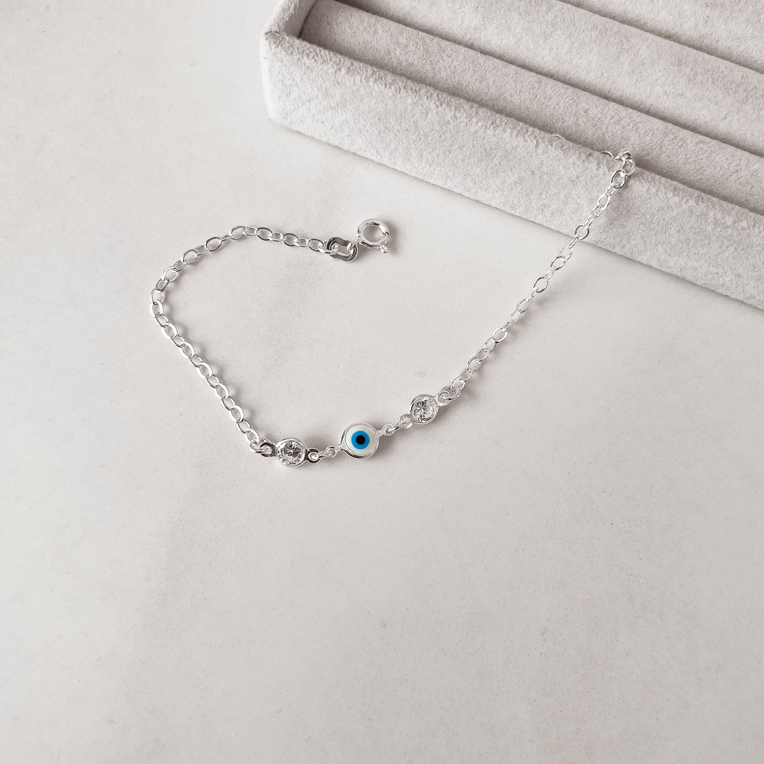 Pulseira entremeio zircônias e olho grego 6mm