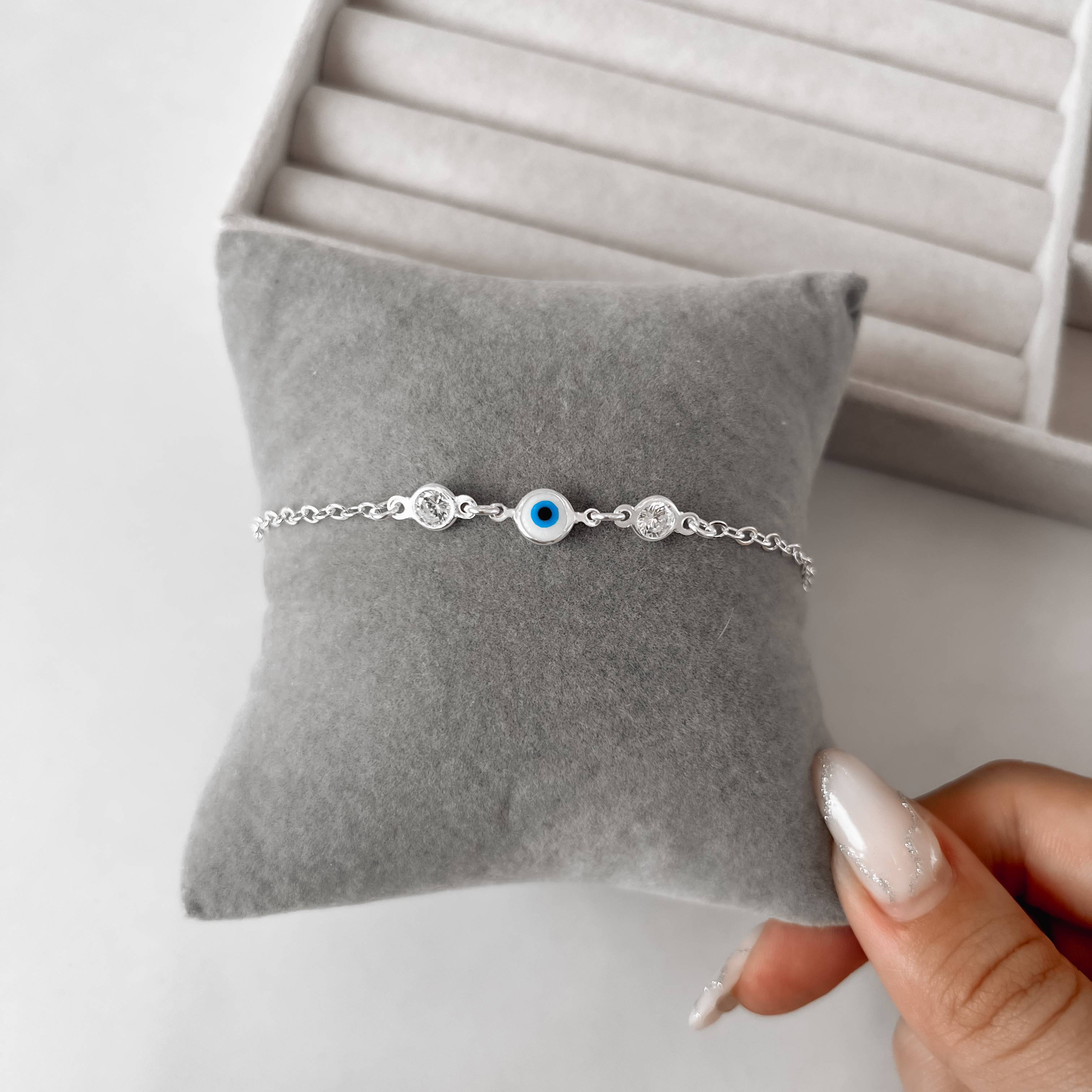 Imagem Secundária Pulseira entremeio zircônias e olho grego 6mm