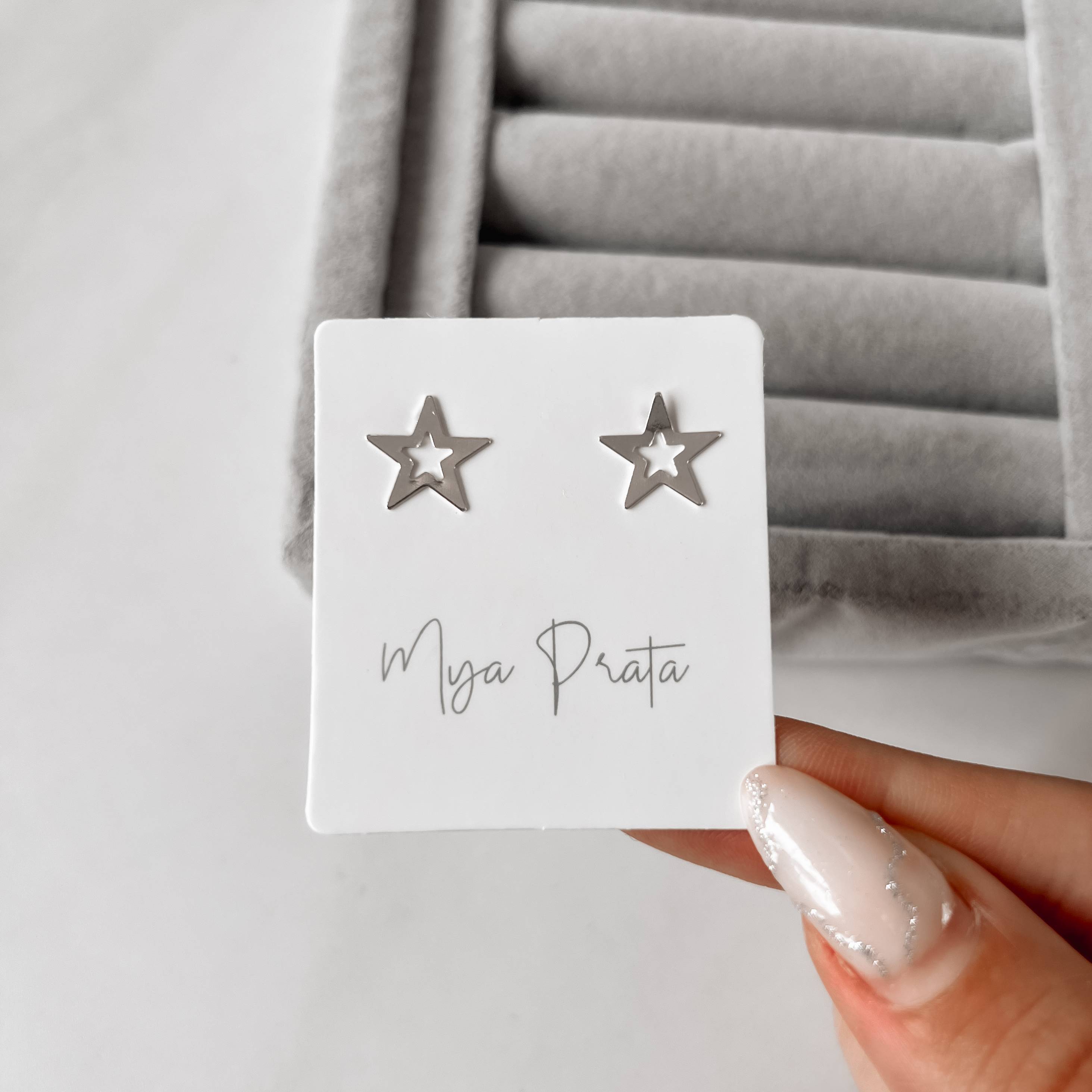 Imagem Secundária Brinco estrela vazada 11mm