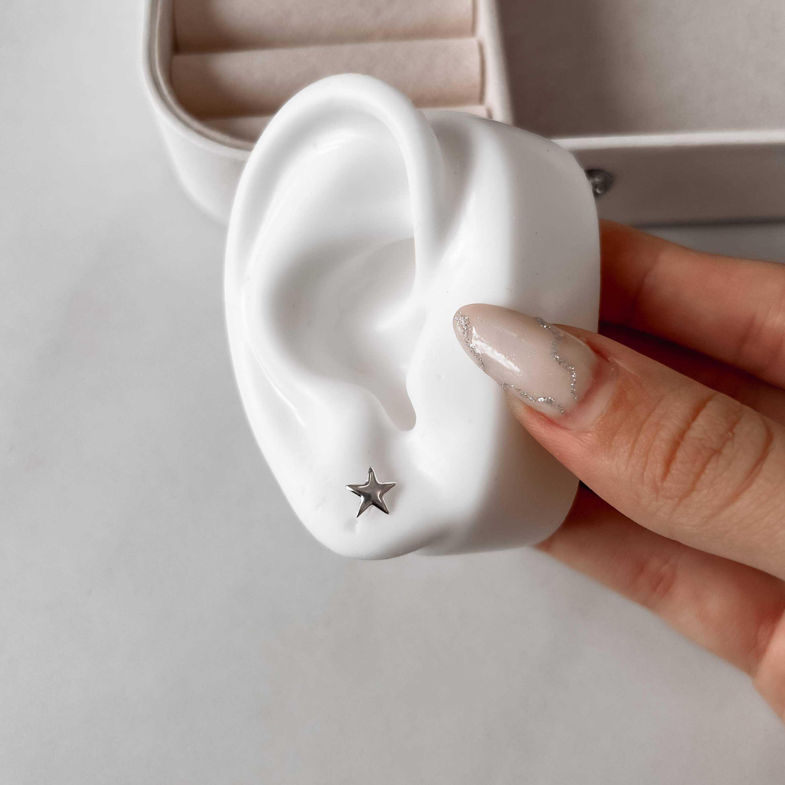Imagem Brinco estrela lisa 7mm
