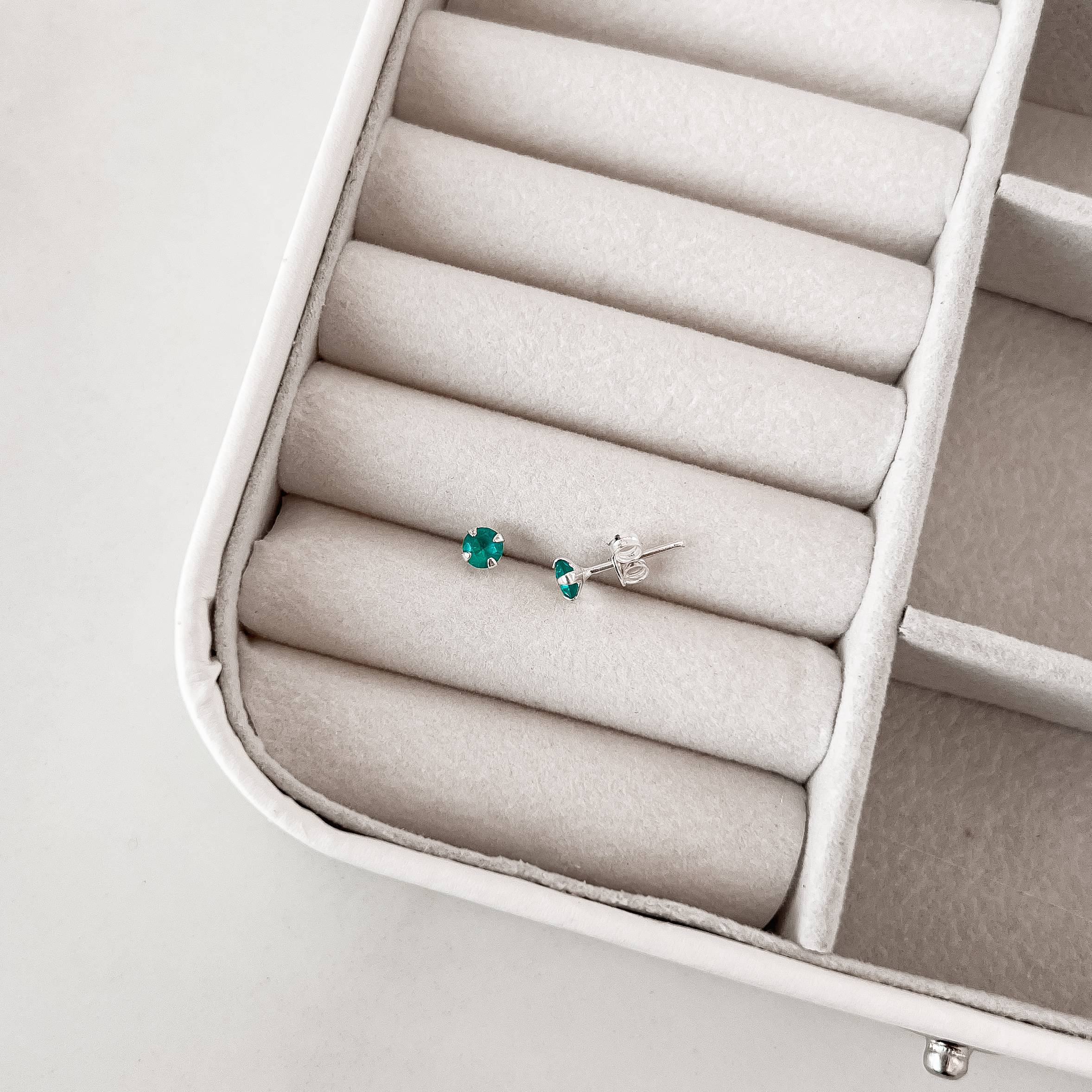 Imagem Secundária Brinco zircônia redonda turquesa leitoso 4mm