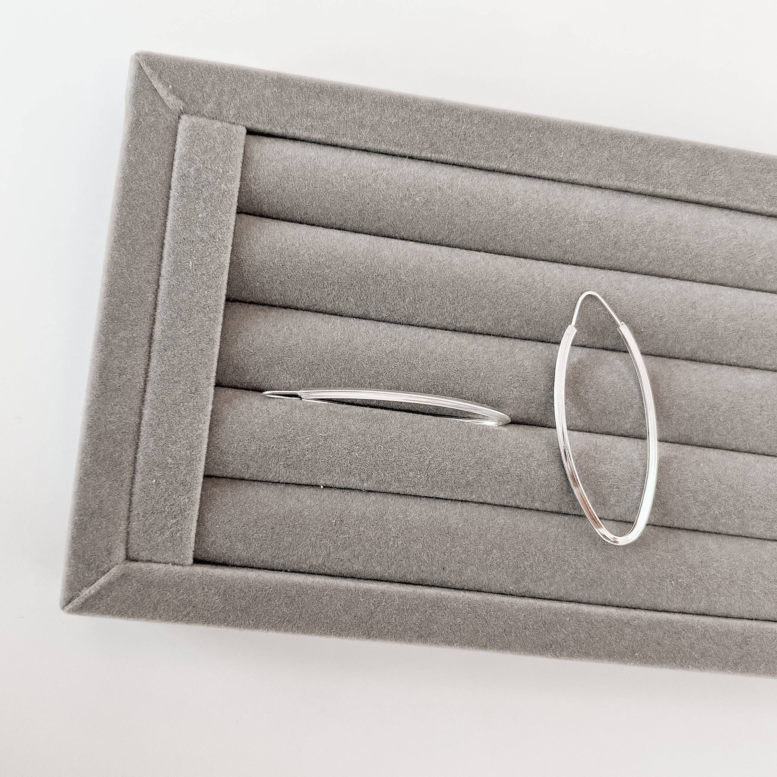 Imagem Argola oval 50x21mm fio triângulo