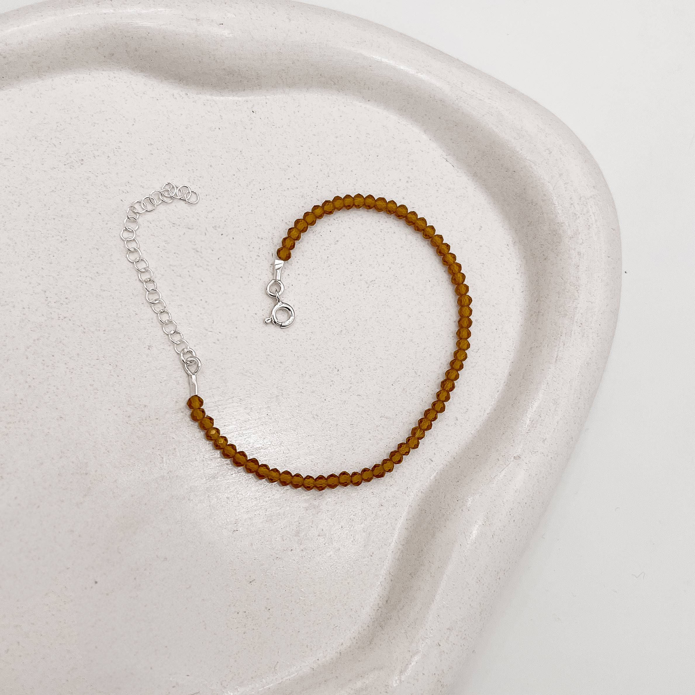 Imagem Secundária Pulseira cristal mostarda 3mm 16cm com alongadora