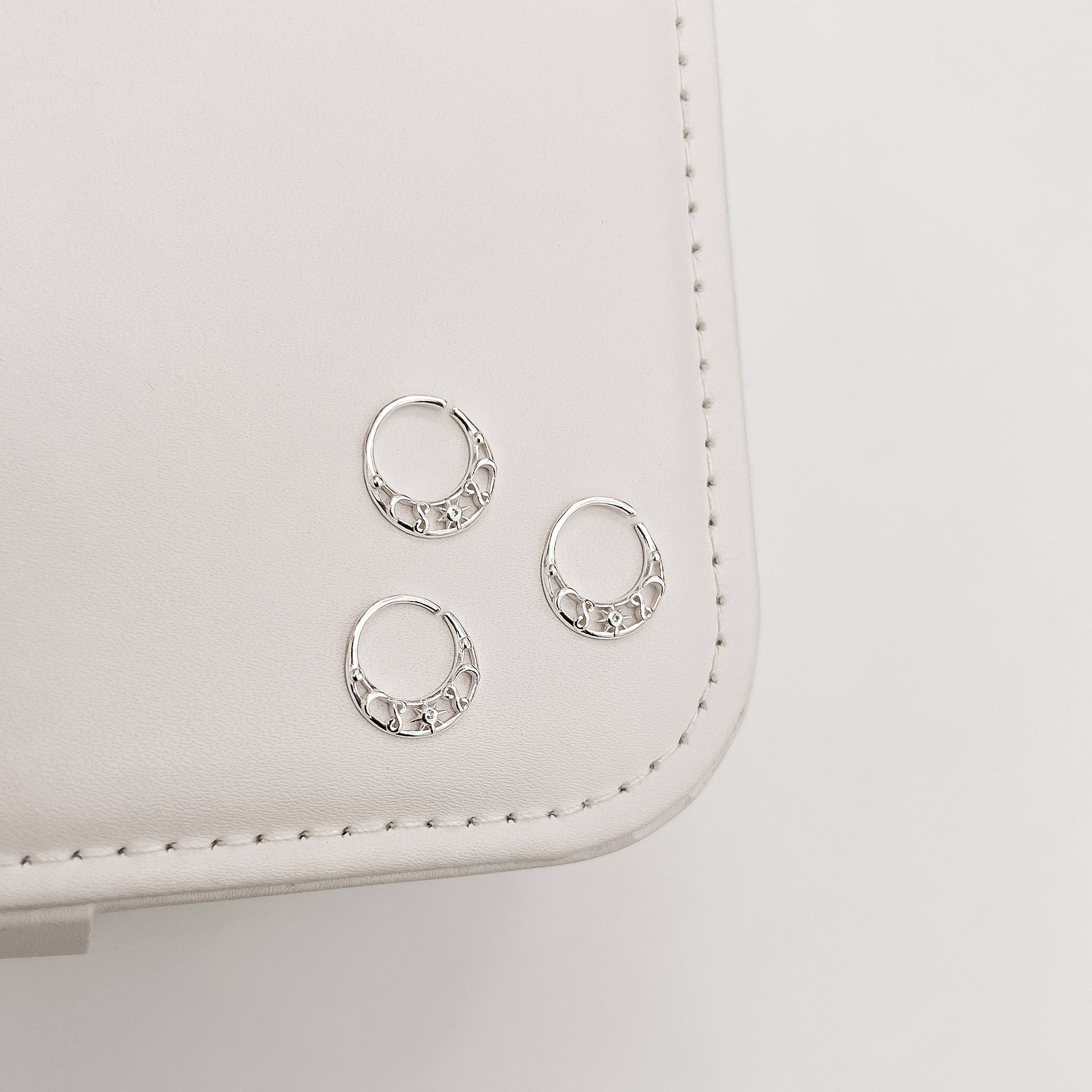 Piercing argola detalhe lua, sol com zircônia e infinito 12mm