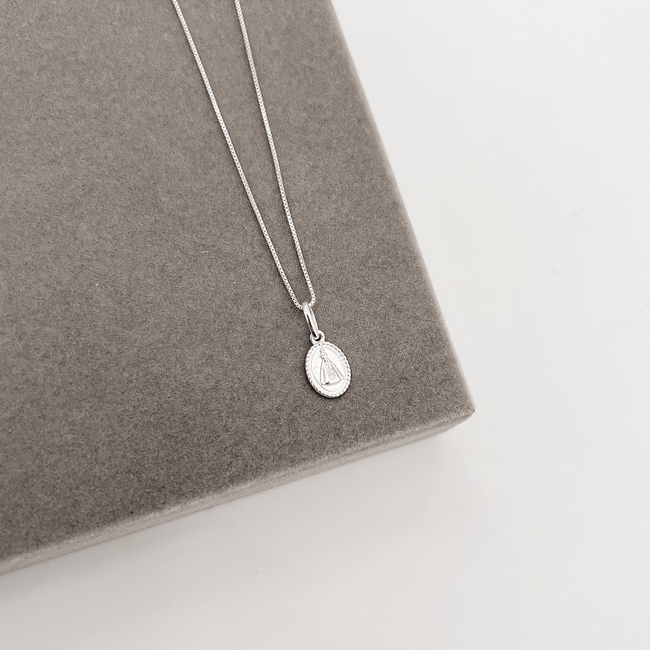 Imagem Colar pingente medalha oval Nsa. Sra. Aparecida 10mm 45cm