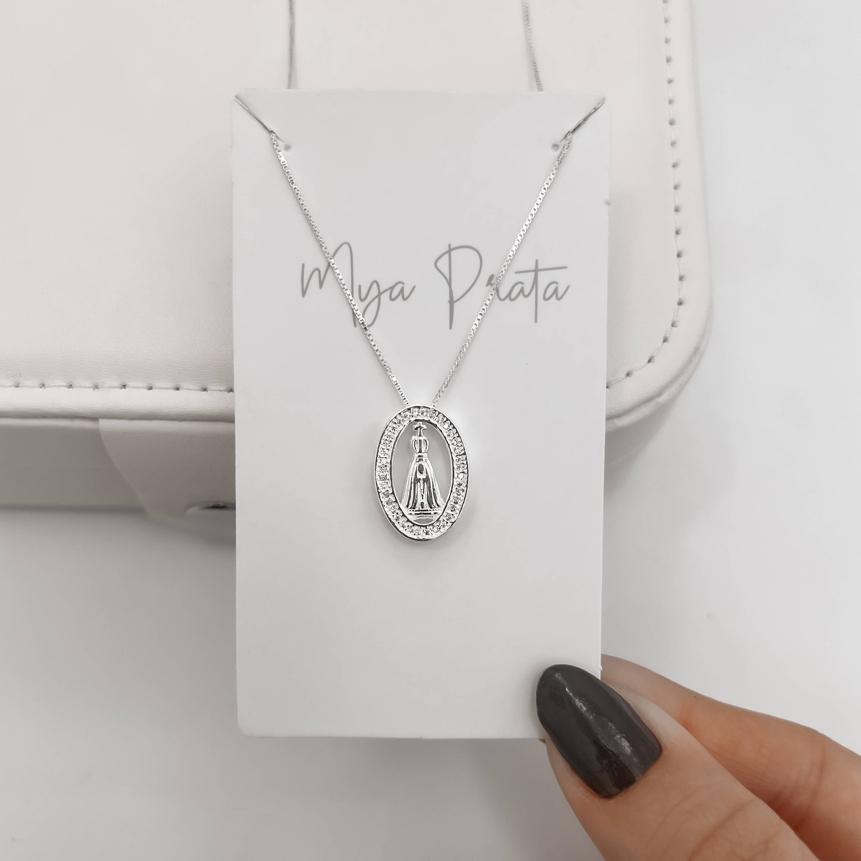 Imagem Colar Nsa. Sra. Aparecida oval cravejada 18mm 45cm