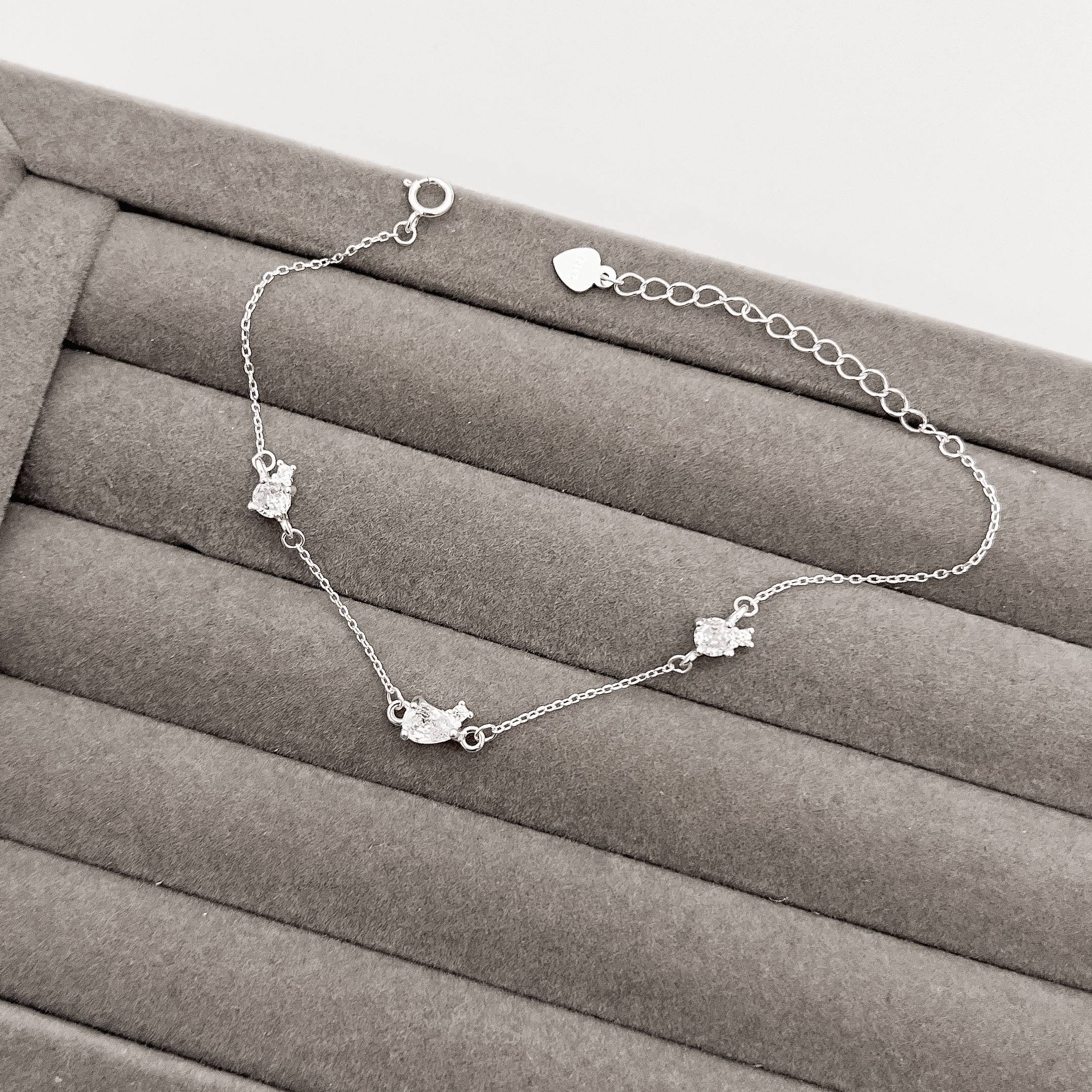 Pulseira entremeios zircônias redonda e gota 7mm