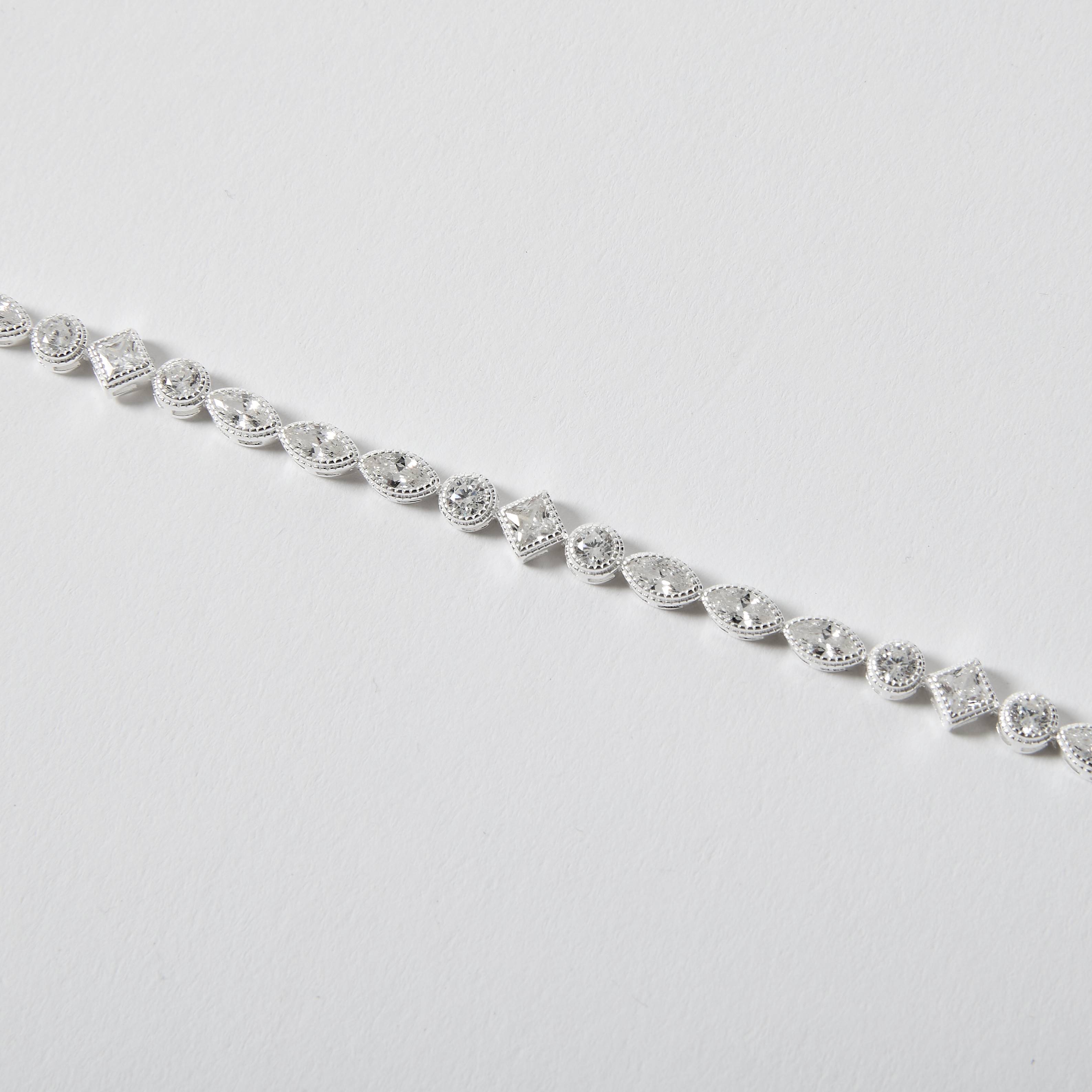 Pulseira entremeios zircônias redonda, losango e navete 6mm 16+5cm