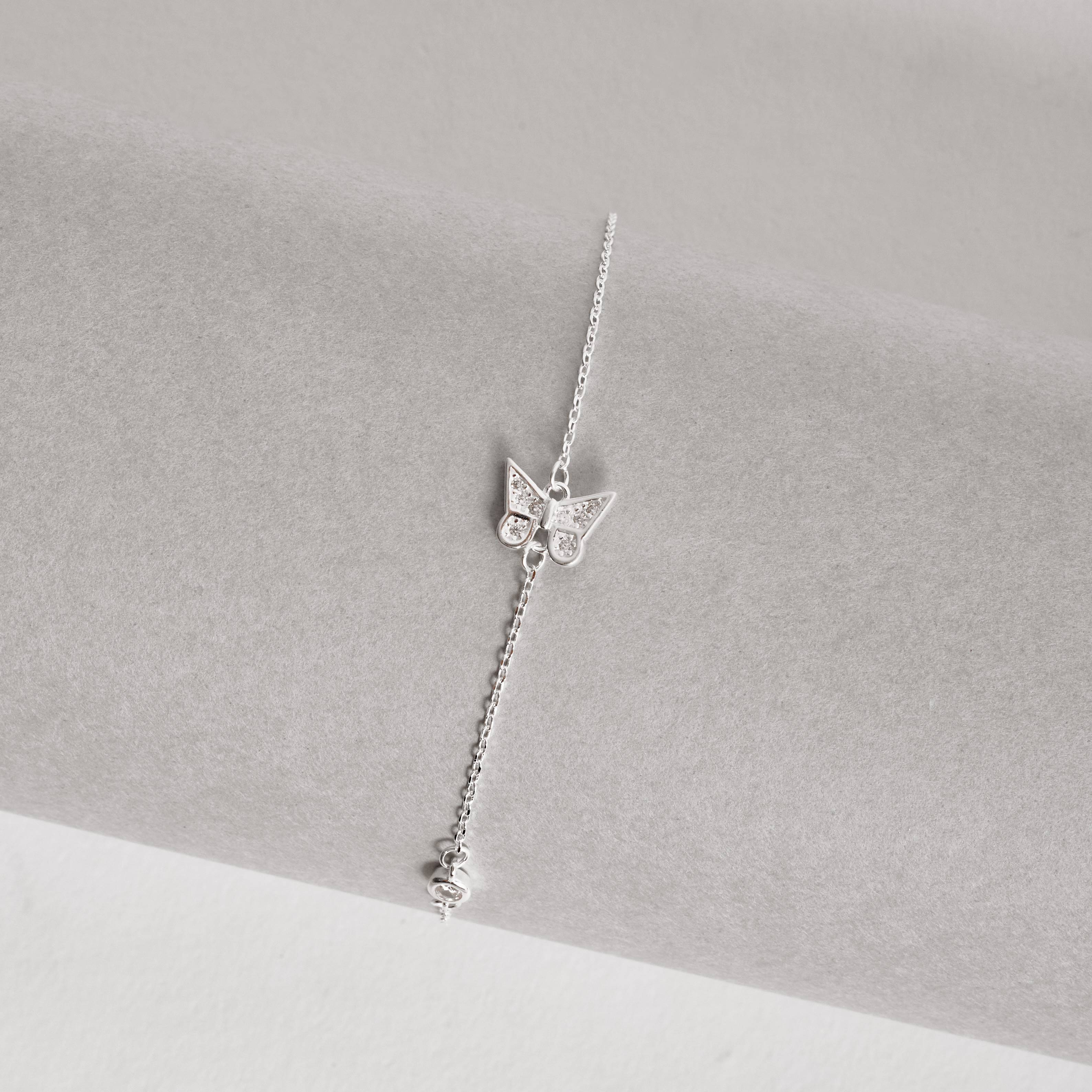 Pulseira entremeios borboleta cravejada e zircônia 16+5cm