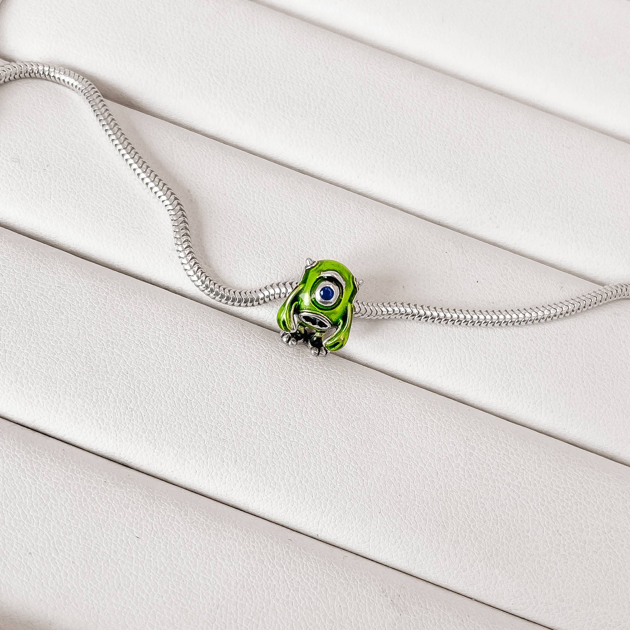 Berloque separador Mike Wazowski resina 13mm envelhecido