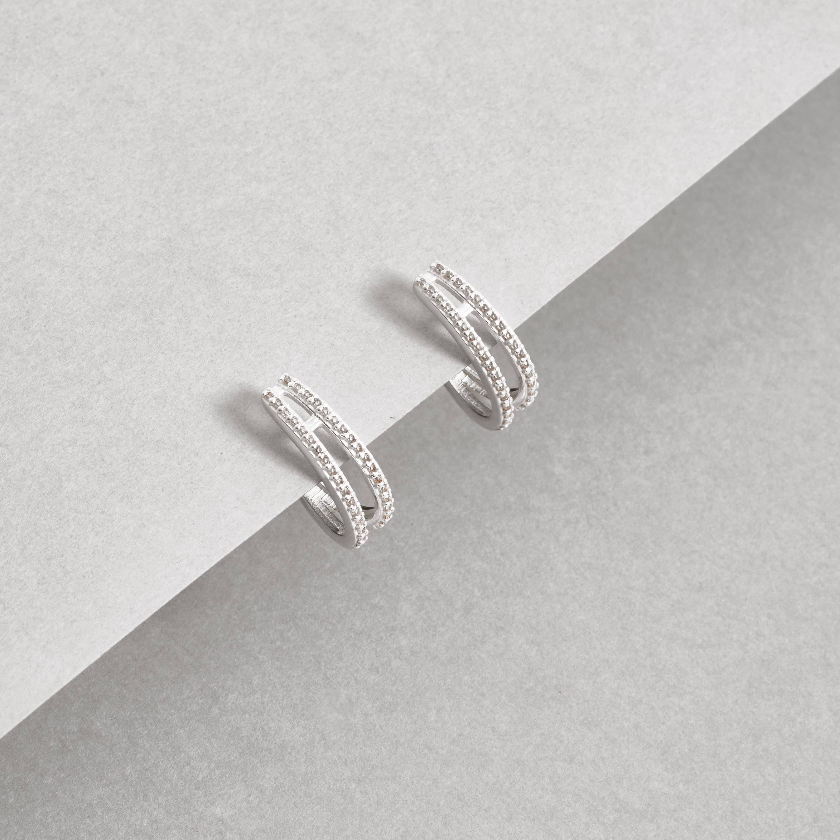 Imagem Secundária Argola oval 2 fios cravejados 18mm tarraxa