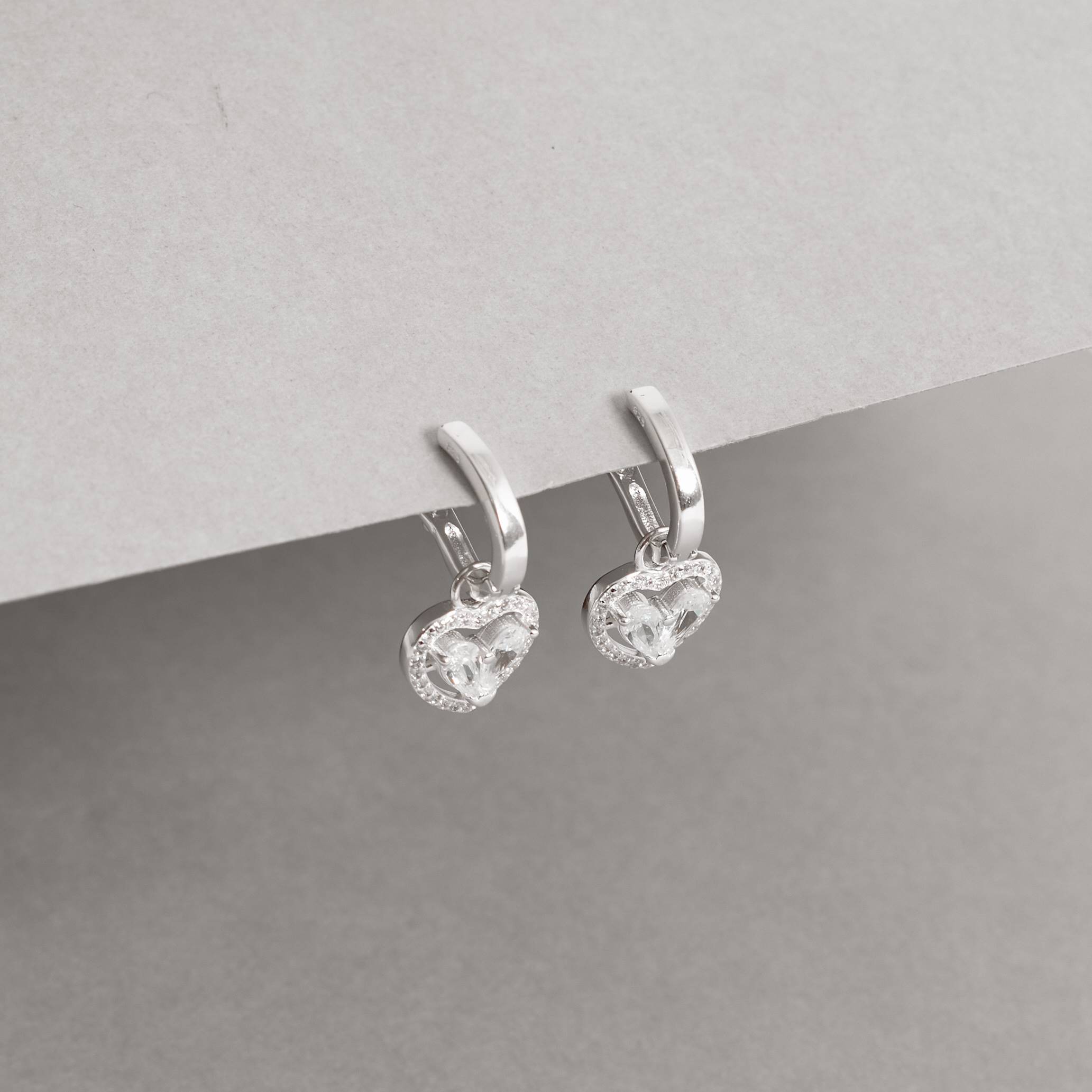 Imagem Secundária Argola click oval 11mm pingente coração vazado cravejado