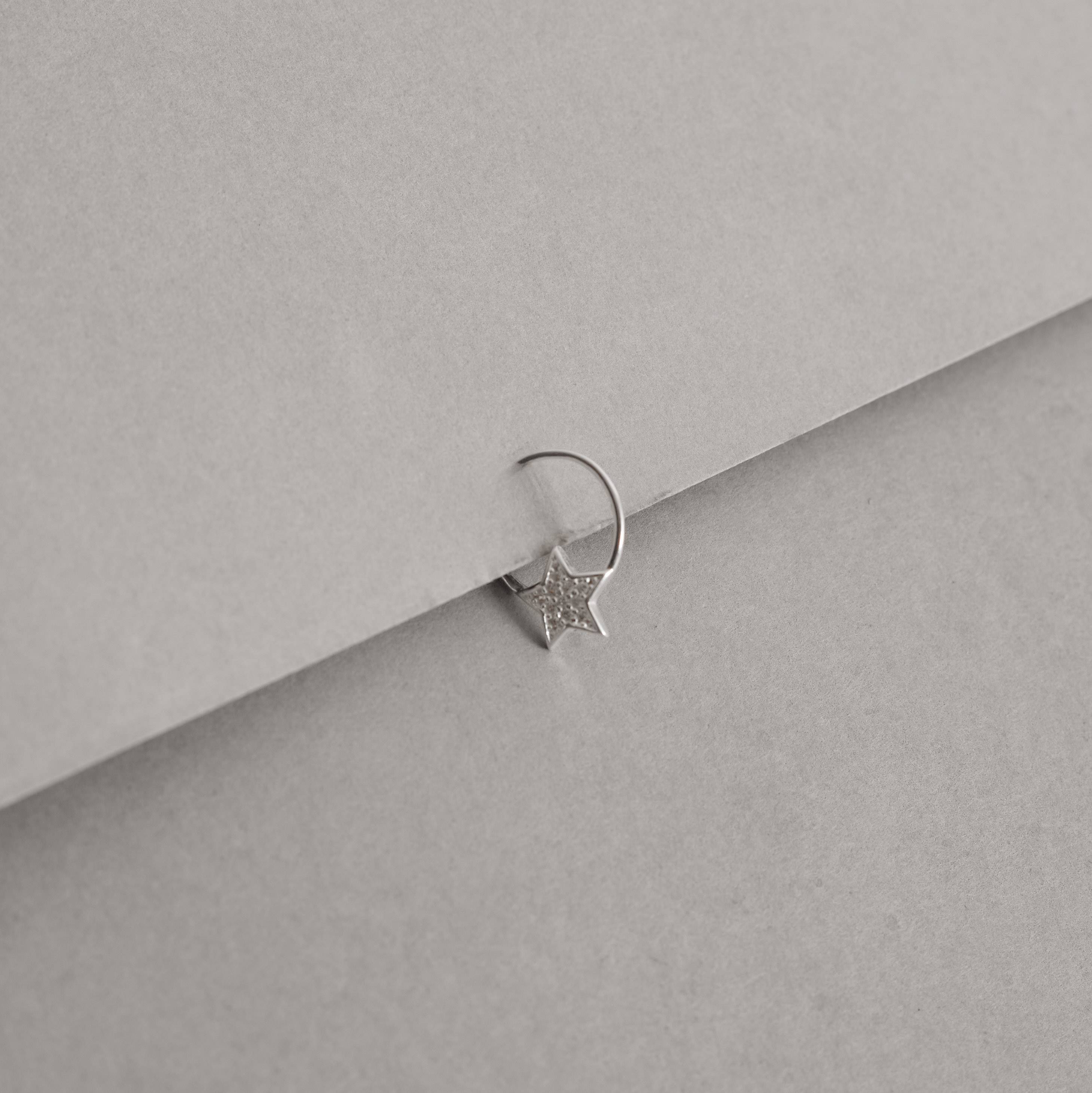 Piercing argola com estrela cravejada 11mm