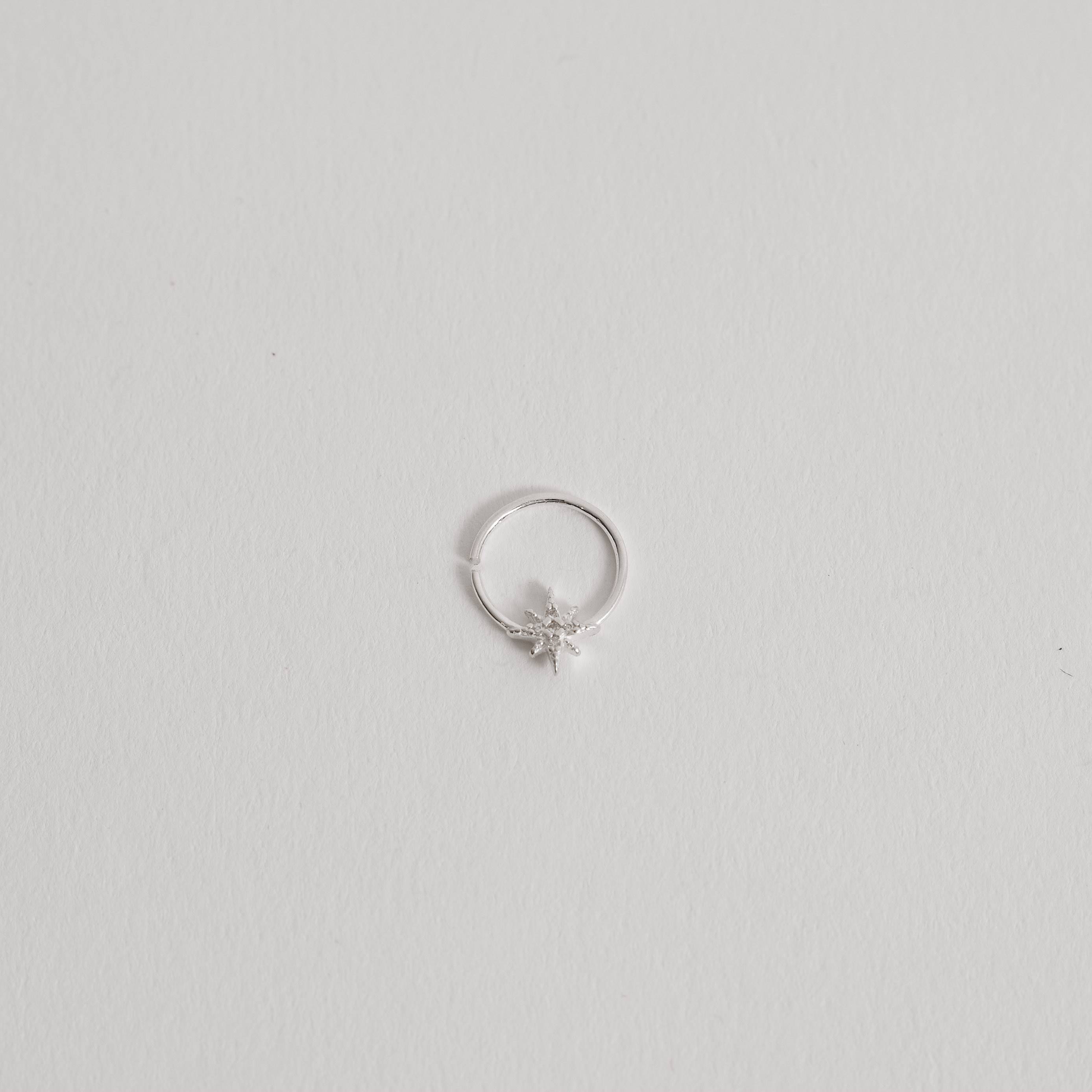 Piercing argola com estrela 8 pontas cravejada 11mm