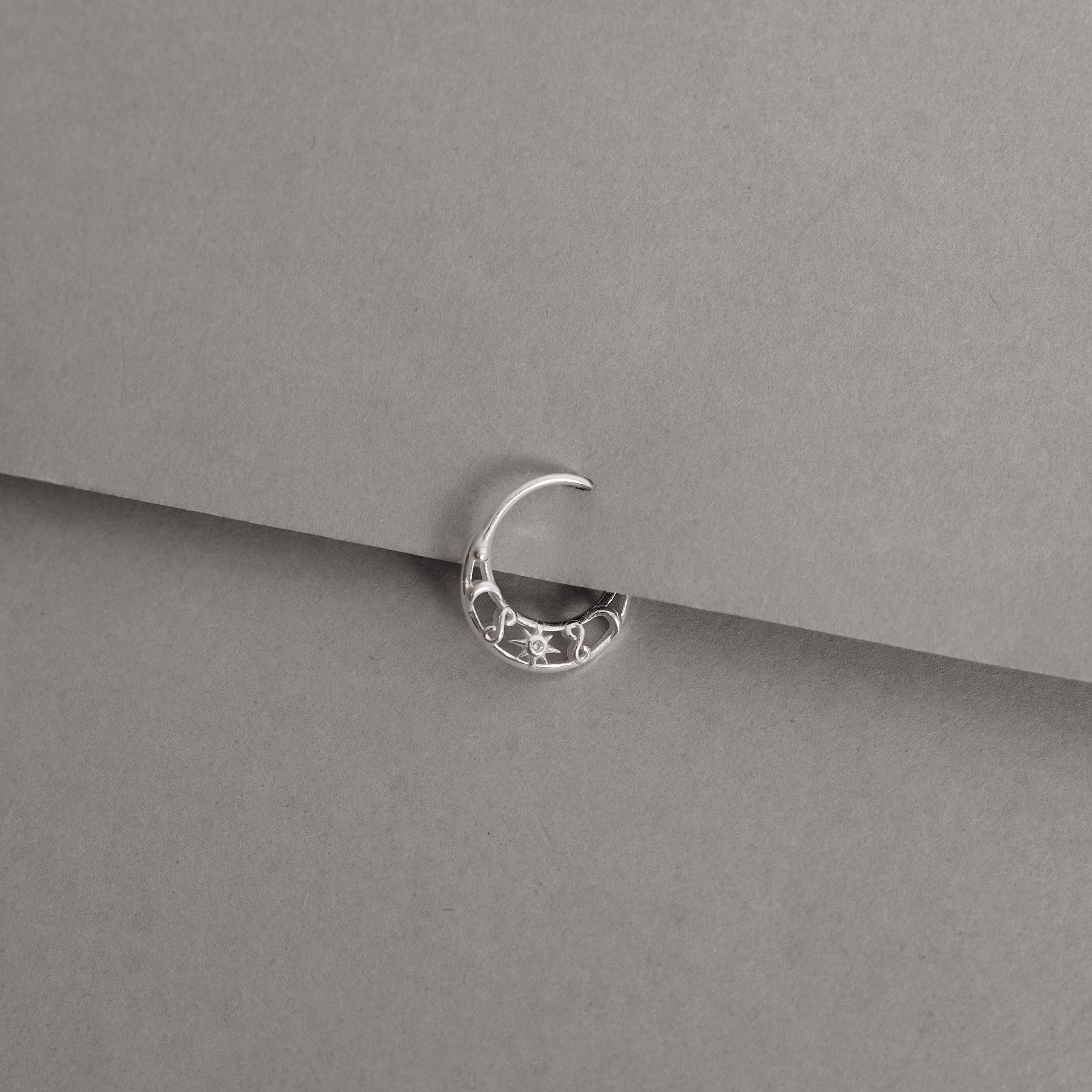 Piercing argola detalhe lua, sol com zircônia e infinito 12mm