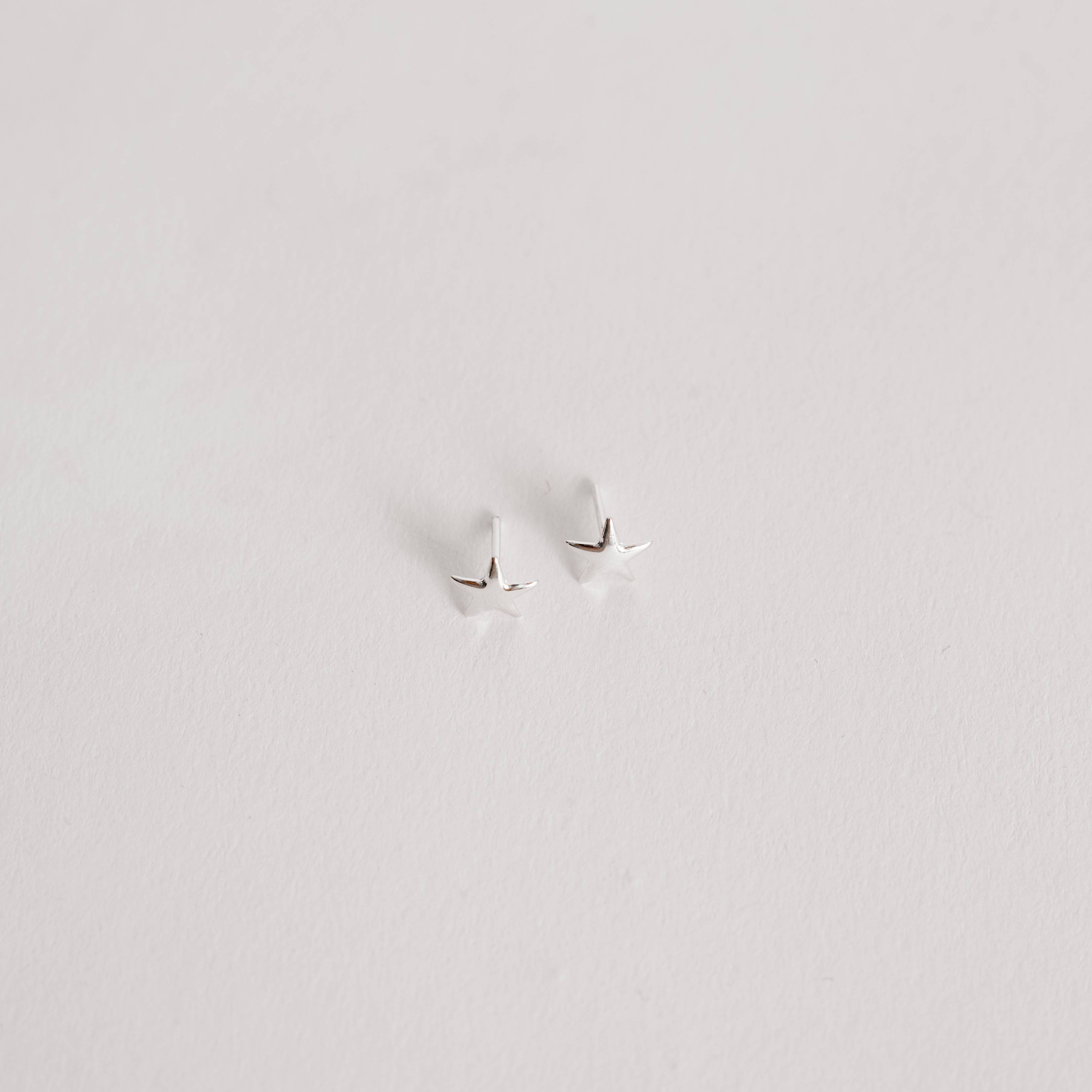 Imagem Secundária Brinco estrela lisa 7mm