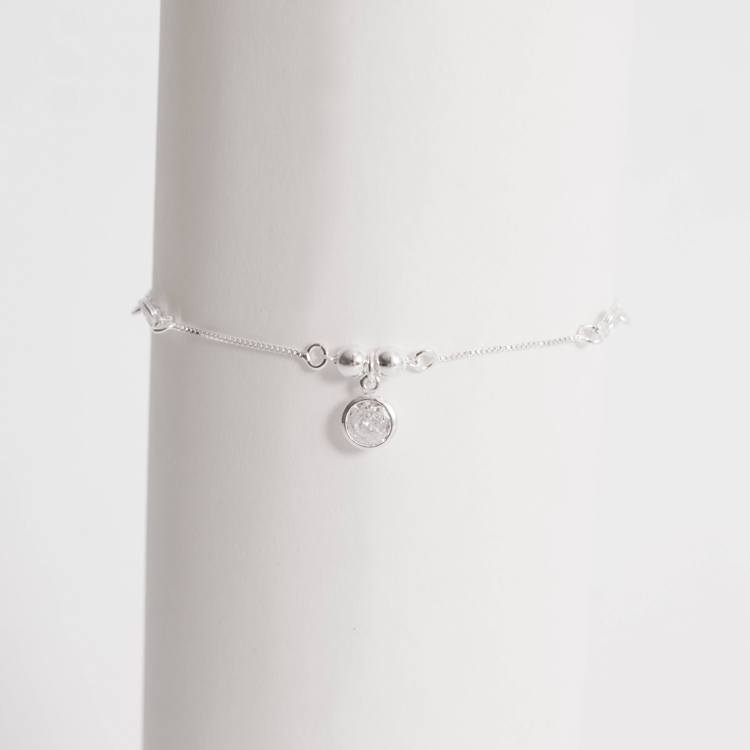 Imagem Secundária Pulseira entremeio bolas e zircônias com pingente zircônia 6mm