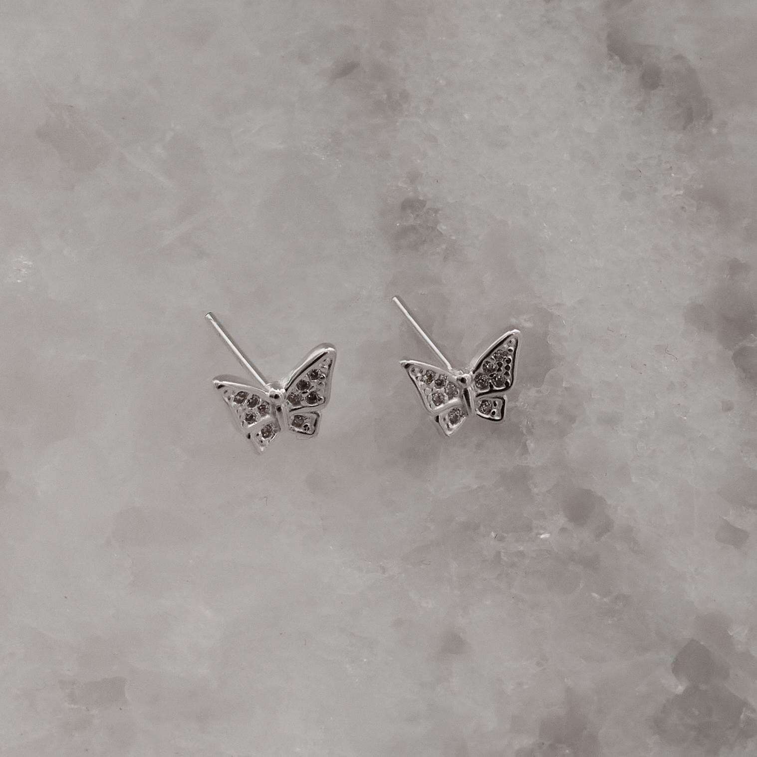 Imagem Secundária Brinco borboleta asa cravejada 9mm