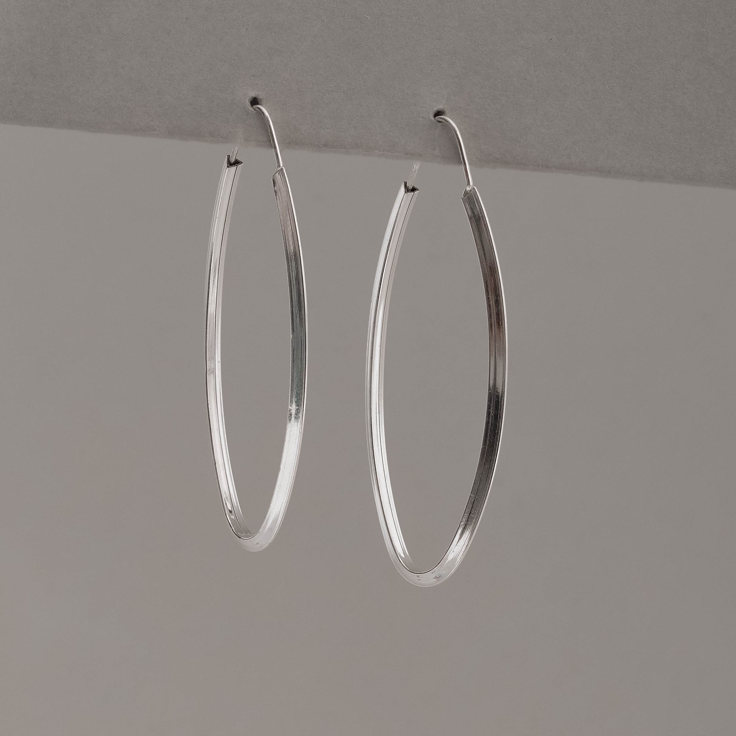 Imagem Secundária Argola oval 50x21mm fio triângulo