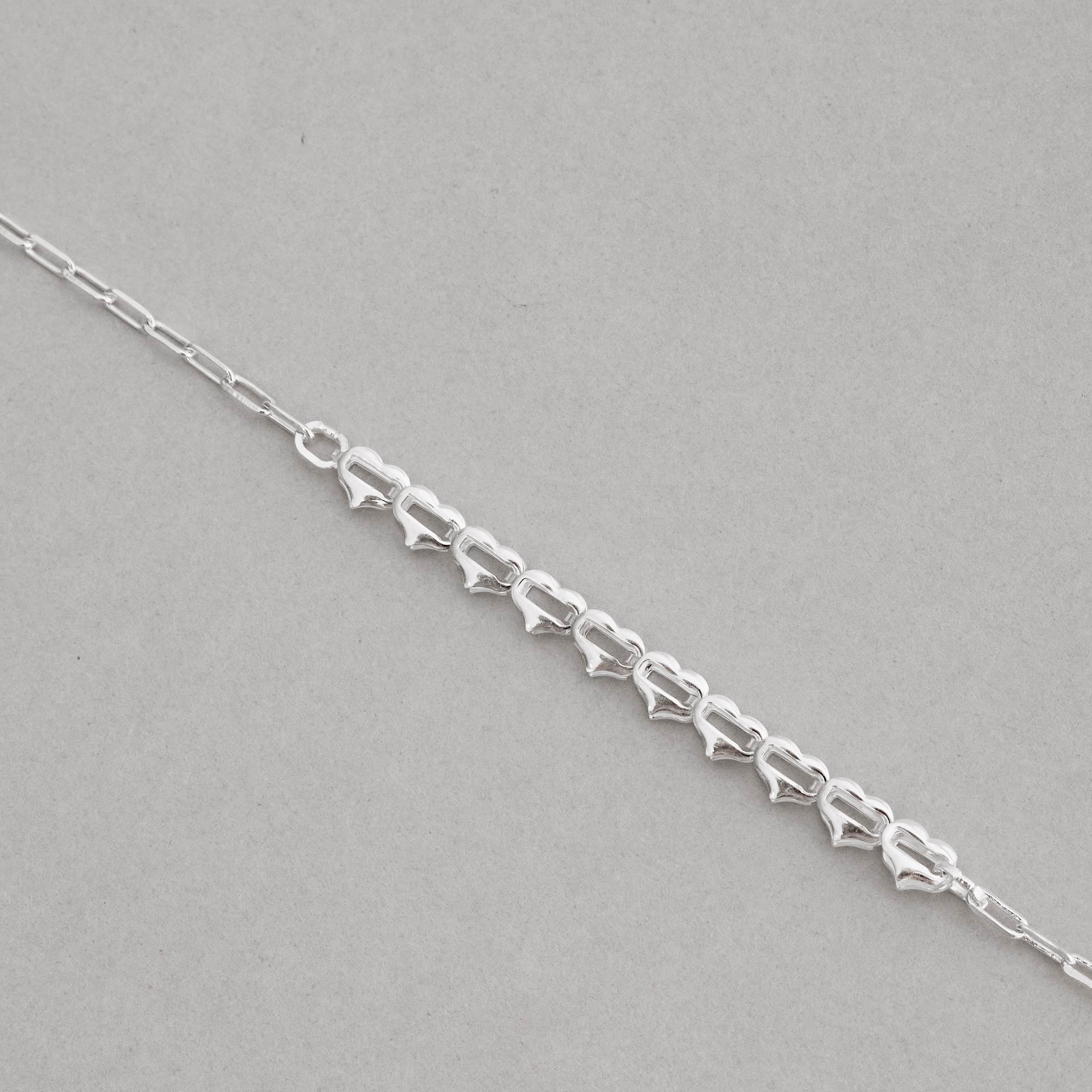 Imagem Secundária Pulseira entremeio corações corrente cartier