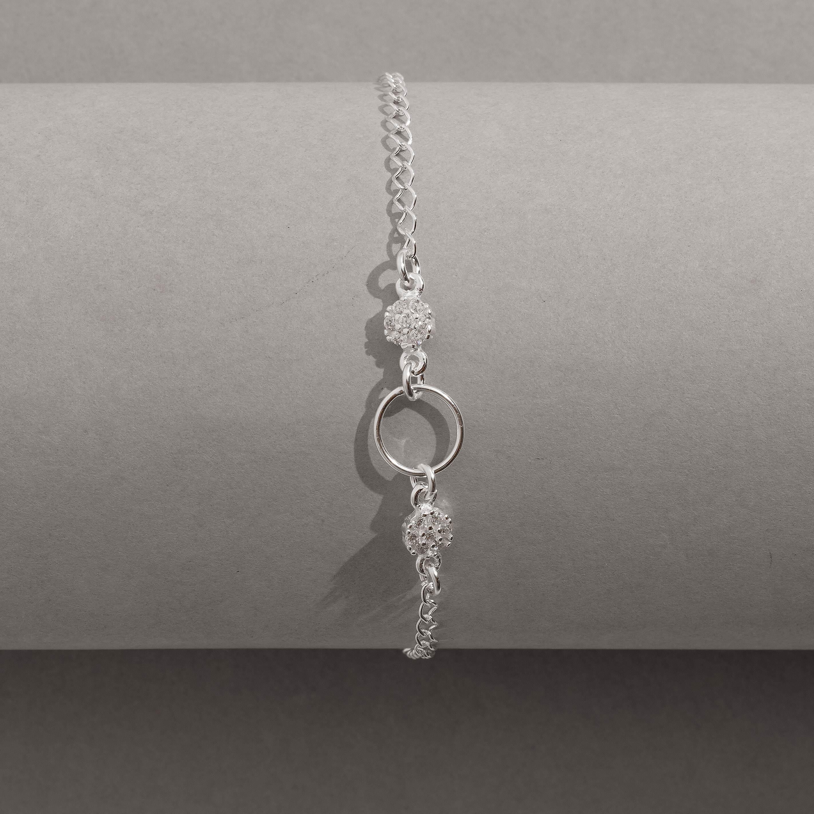 Imagem Secundária Pulseira entremeio círculo vazado 9mm com botões cravejados 18cm com alongadora