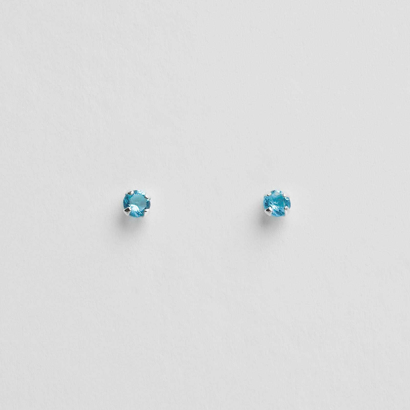 Imagem Brinco zircônia redonda azul 3mm garra