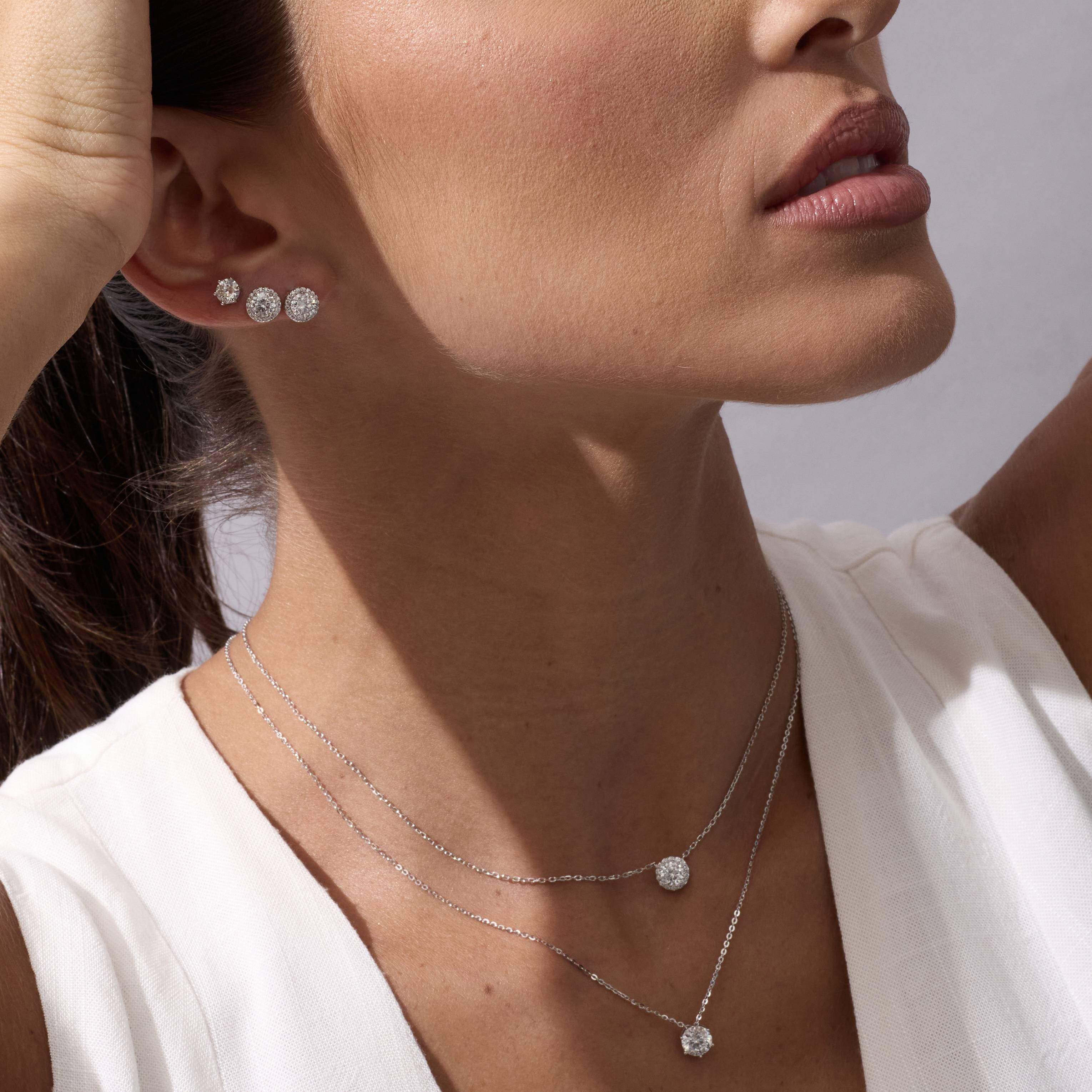 Imagem Secundária Brinco moissanite 5mm com cravejado cristal ródio