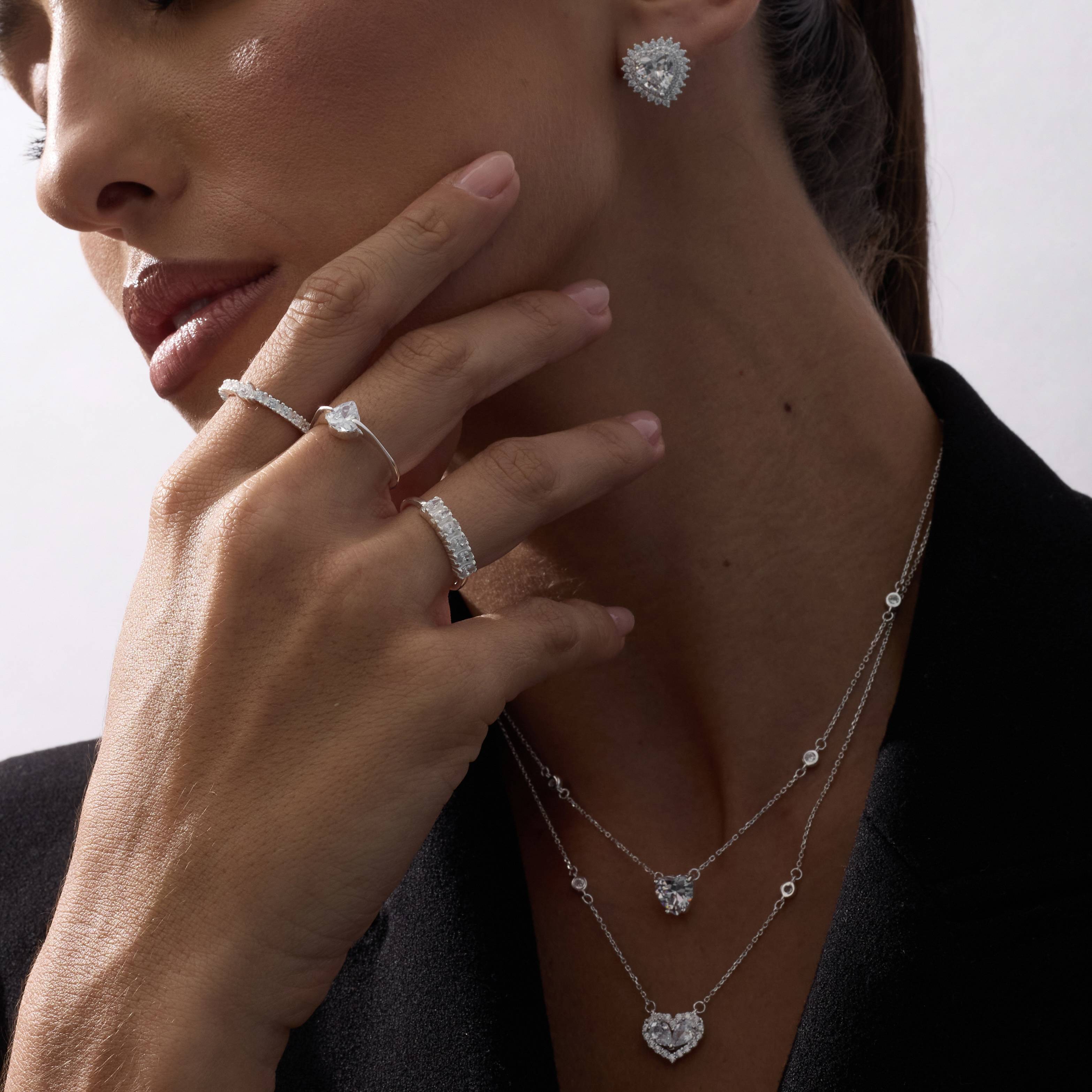 Imagem Secundária Anel meia aliança zircônias navete