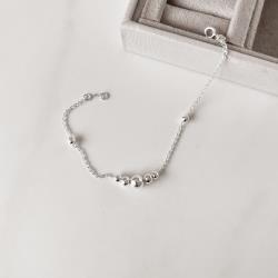 Pulseira entremeios bolas