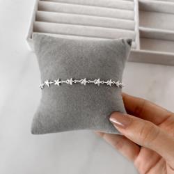 Pulseira entremeios estrela com vinco